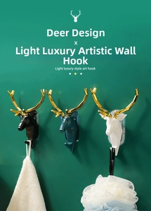 Moderne geometrische Hirschkopf-Wandhaken in Schwarz und Gold für Deko und Ordnung