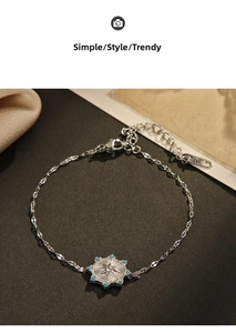 Detail of silver octagonal star bracelet with turquoise stones and adjustable chain