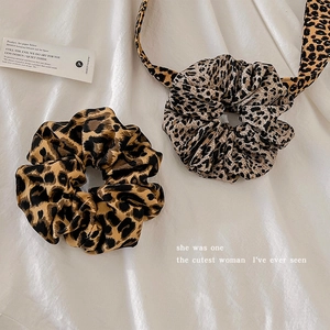 Vintage leopard print scrunchies set including a large hair tie and a ribbon hair rope