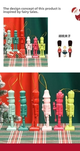 Detailed view of six colorful 13cm wooden nutcracker soldiers with festive gold hanging loops