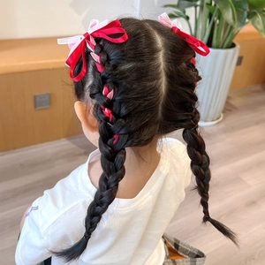 Pink and red ribbon bow hairbands braided into pigtails for young girls hairstyles