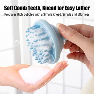 Blue ergonomic silicone scalp massager brush creating rich foam for hair washing