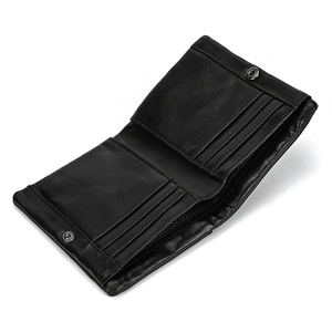 Interior detail of a black genuine leather bifold wallet with card slots and a zipper pocket