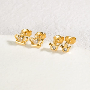 Detail of gold crown stud earrings with heart zircons and S925 sterling silver hallmarks