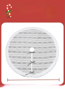 Detail of 48 inch white knitted Christmas tree skirt featuring grey snowflake patterns