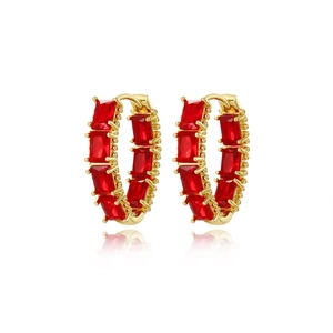 Elegant gold earrings with square-cut red zircon stones featuring a reflective base