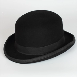 Classic black wool felt bowler hat with a grosgrain ribbon in vintage British style
