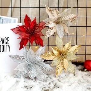 Glitter poinsettia Christmas flowers in red gold and silver for holiday tree decor