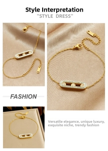 Macro detail of gold plated bracelet featuring three sliding diamonds in oval frame