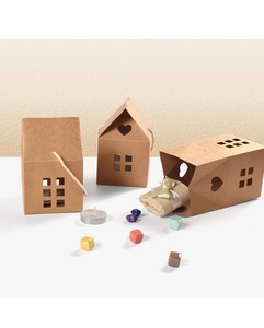 Detailed view of house-shaped kraft paper gift boxes with cutout windows and twine handles