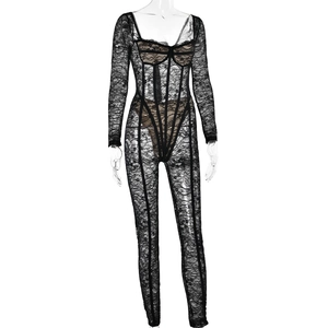 Close-up of black lace patchwork and sheer mesh texture on sexy tight jumpsuit