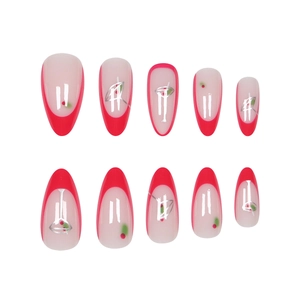 Long almond French press-on nails with red tips and silver abstract cocktail patterns
