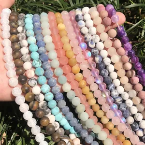 Mix of colorful natural stone beads like turquoise and rose quartz for DIY jewelry