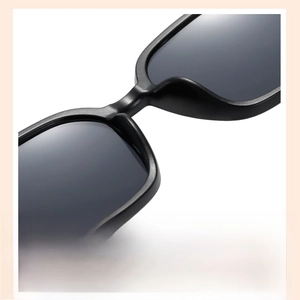 Close-up of integrated nose pads on black vintage square frame sunglasses for children