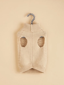 Detail of beige knit pet sweater showing high collar design on a pearl hanger