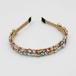 Elegant thin gold headband featuring colorful faceted crystal stones for party or casual wear