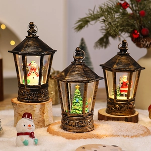 Vintage bronze Christmas postbox lantern with snow scene and warm LED light decoration