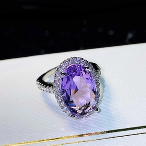 Oval purple amethyst ring with halo micro-pave zirconia in a classic silver setting