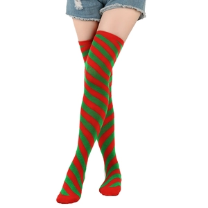 Festive red and green striped over-knee high socks with elastic knitted texture