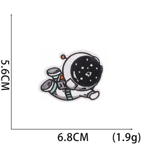 Detailed size view of a cartoon astronaut embroidery patch with dimensions of 6.8cm and 5.6cm