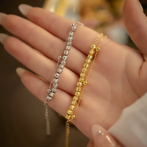 Double-layered S925 silver beaded bracelet for women in gold and silver finish