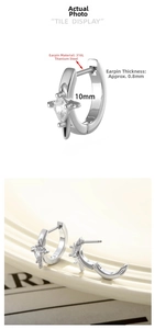 Detail of 316L surgical steel star hoop earrings with clear zircon stone, 10mm inner diameter