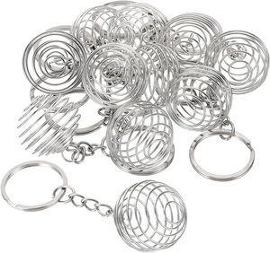 Detail of silver spiral bead cage keychains with flexible metal wire for DIY jewelry