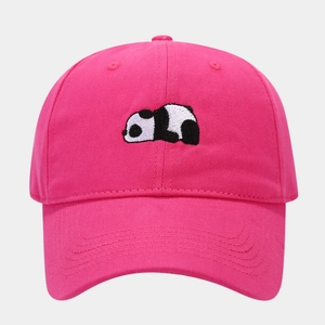 Close-up of pink cotton baseball cap with cute panda embroidery and classic curved brim