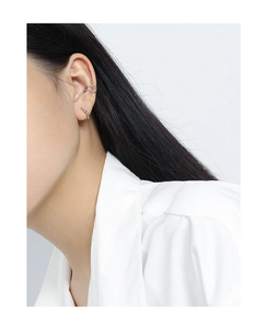 Close-up of S925 sterling silver olive bead earrings and ear cuffs on model's ear