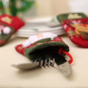 Christmas snowman glove cutlery holder set for festive restaurant tabletop decoration