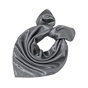 Detailed close-up of dark grey satin scarf showing glossy silk texture and elegant folds