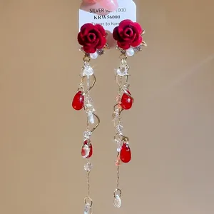 Elegant red flocking rose earrings with long gold tassels and teardrop pearl charms