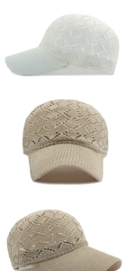 Detailed view of breathable hollow knit pattern on white and beige sun visor baseball caps