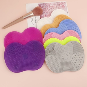 Silicone heart-shaped makeup brush cleaning mats in multiple colors for brush washing