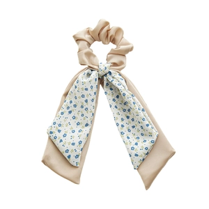 Floral print scrunchie with beige satin ribbon bow tie for women ponytail holder