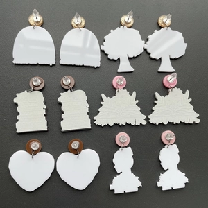 Set of 6 pairs teacher school themed earrings showing back view with colorful studs
