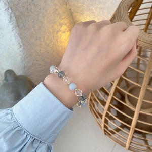 Close-up of ocean blue mermaid beaded bracelet with sea aquamarine and crystal beads