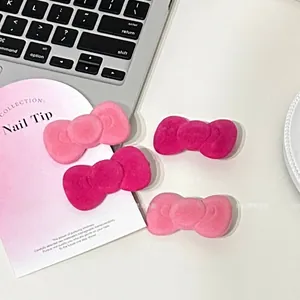 Pink and rose red flocked velvet bow hair clips for women in a four-piece set