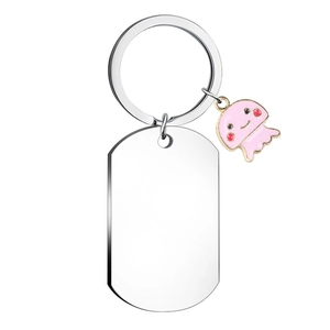 Detail of silver stainless steel dog tag keychain with pink jellyfish charm accessory