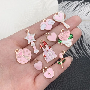 Pink heart and key charm pendants for DIY jewelry making in gold alloy finish