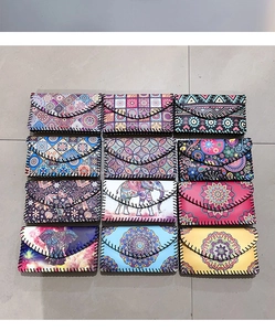 Collection of ethnic patterned crossbody phone bags with unique handmade stitching details
