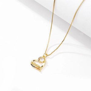 Golden heart-shaped MOM pendant necklace with micro-paved cubic zirconia accents