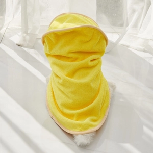Detail of bright yellow microfibre pet towel robe with soft coral fleece texture