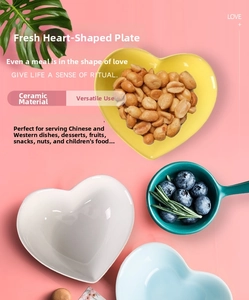 Detailed view of colorful heart-shaped ceramic bowls for desserts and snacks in various colors