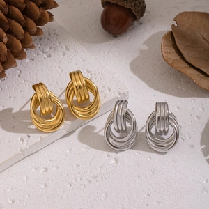 Boucles d'oreilles circulaires multicouches géométriques en acier doré et argenté
