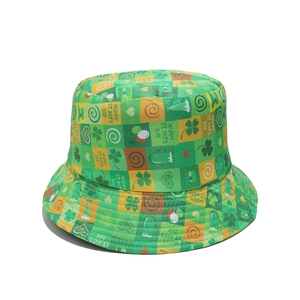 Detail of St. Patrick's Day bucket hat with shamrock patterns and holiday lettering