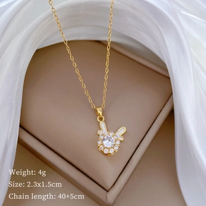 Golden rabbit pendant with white zircon and enamel on a 40+5cm titanium steel chain