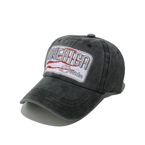 Detail of vintage washed gray cotton baseball cap with AMERICA denim embroidery