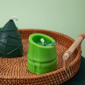 Bamboo and zongzi shaped scented candle set in a rustic woven tray for home decor