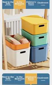 Stackable plastic storage bins with lids and handles in assorted vibrant colors